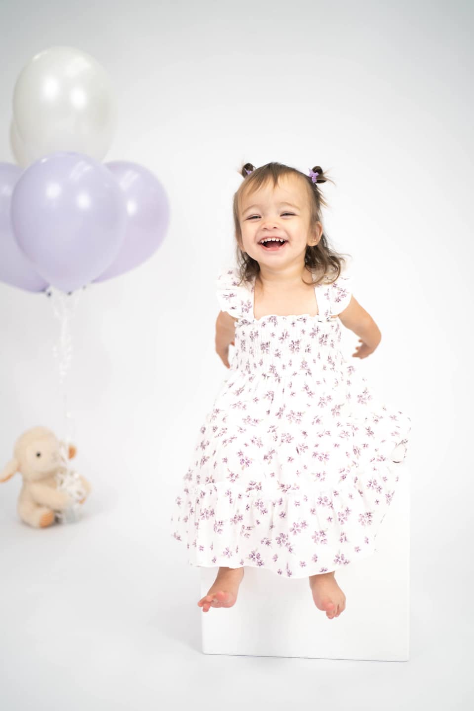 Child celebrating a first birthday with soft studio styling during a Vacaville session.